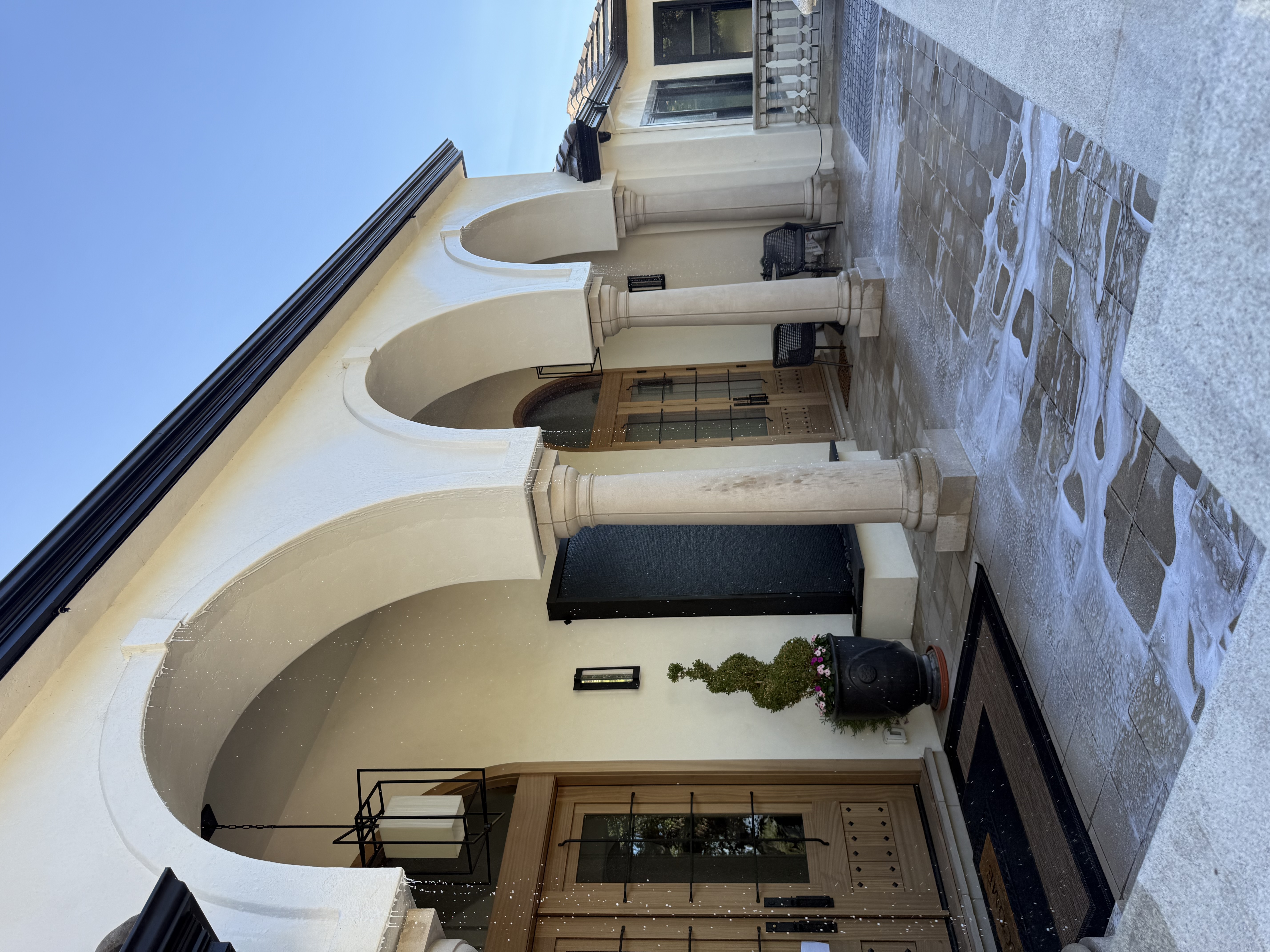 Bay Area estate after FireRoofs automated water rinse cycle with foam cleared and property restored