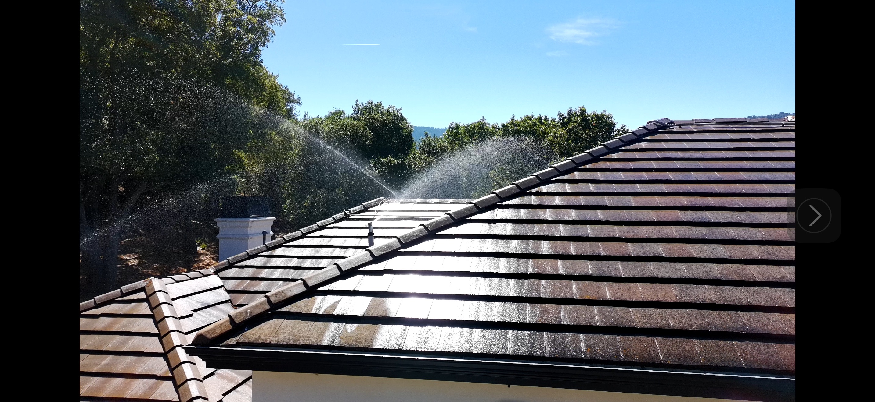FireRoofs roof sprinkler system with full coverage across wide roofline