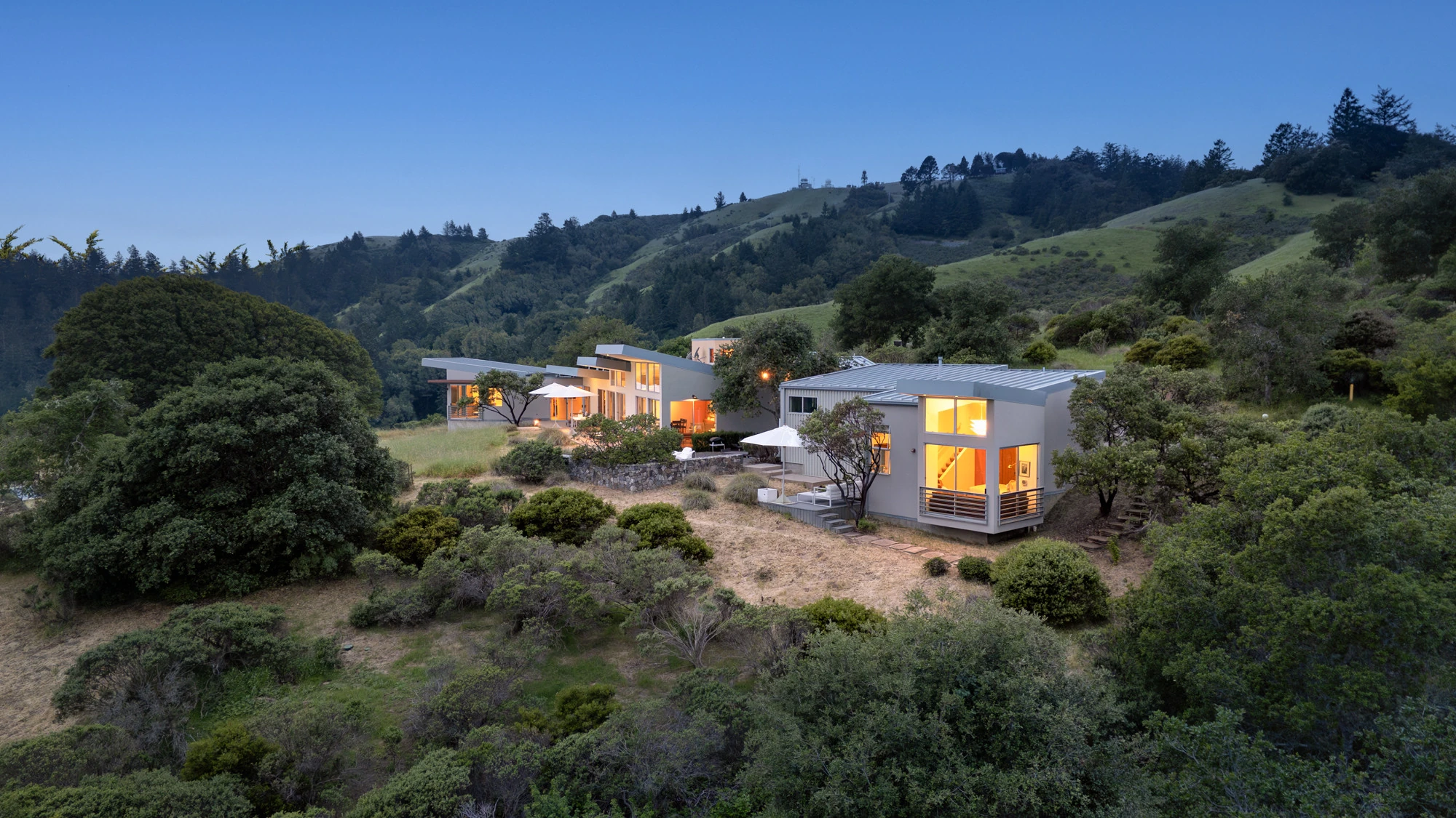 Upscale California home nestled in wooded hills — the Wildland-Urban Interface setting FireRoofs protects from wildfire